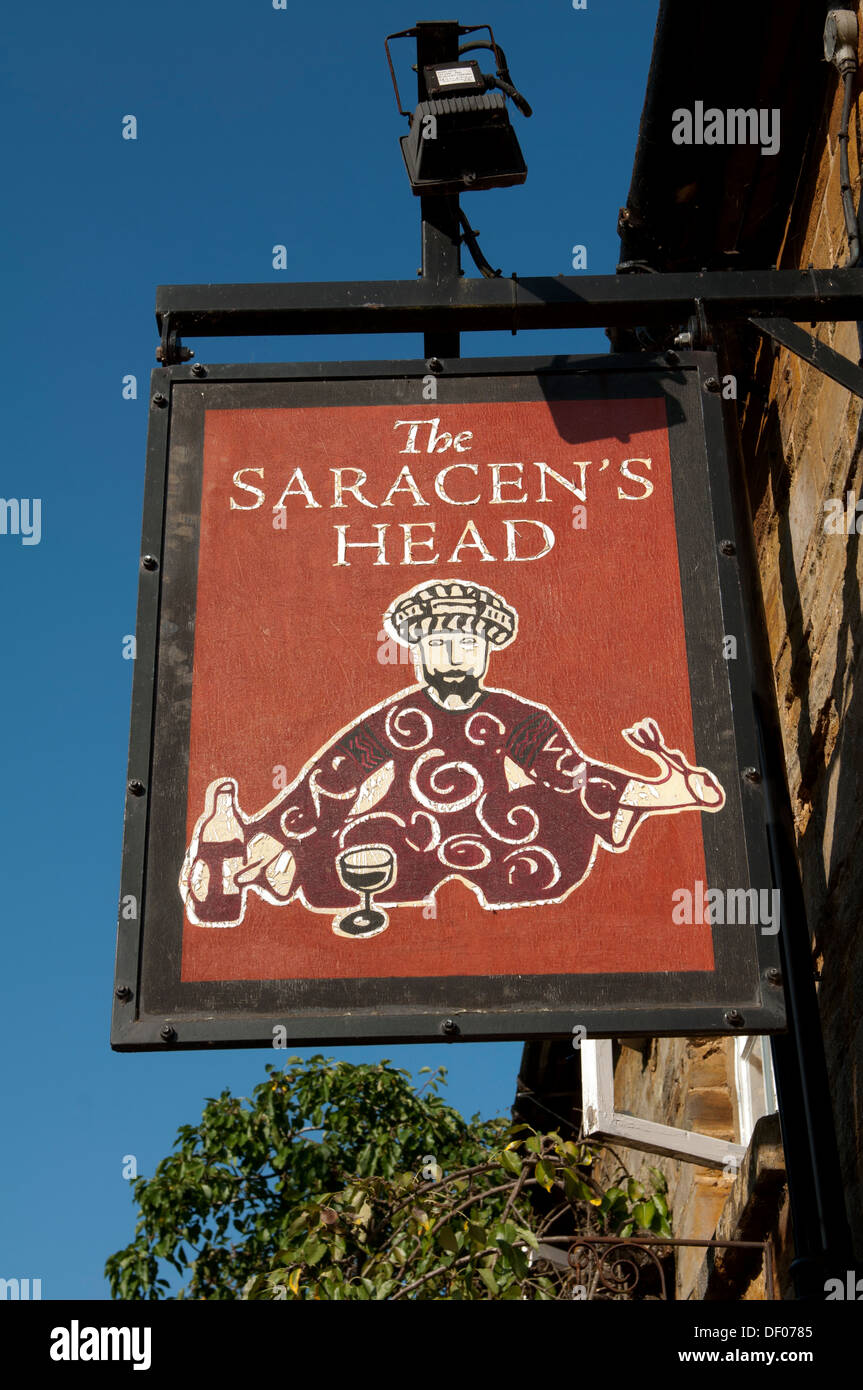The Saracen`s Head pub sign, Little Brington, Northamptonshire, England, UK Stock Photo
